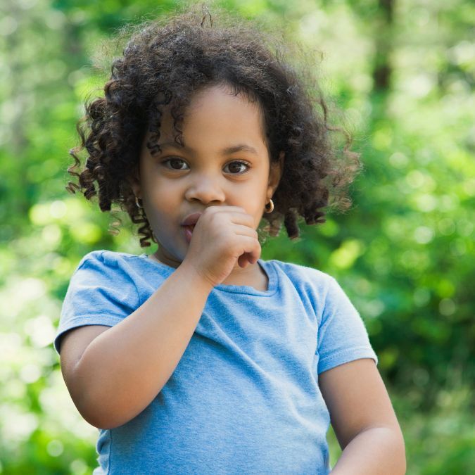 Girl sucking her thumb